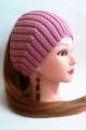 Вязаная женская повязка на голову ручной работы.